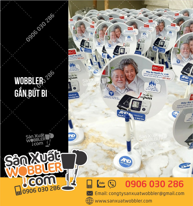 Mâu-Wobbler-gắn-bút-bi-quảng-cáo-máy-đo-huyết-áp-AND