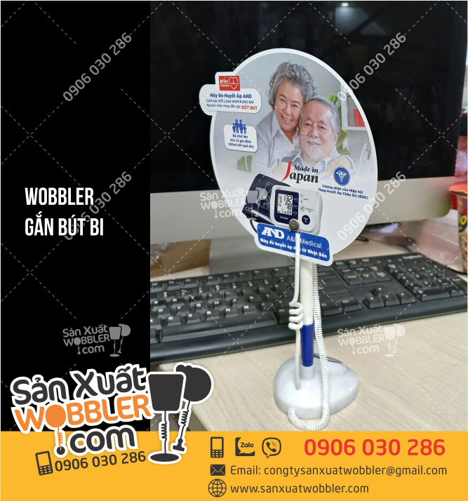 Sản-xuất-Wobbler-gắn-bút-bi-quảng-cáo-máy-đo-huyết-áp-AND-tại-TP-HCM